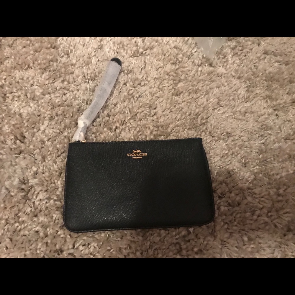 Brand new large Coach wristlet